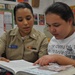 USS Emory S. Land sailors tutors students