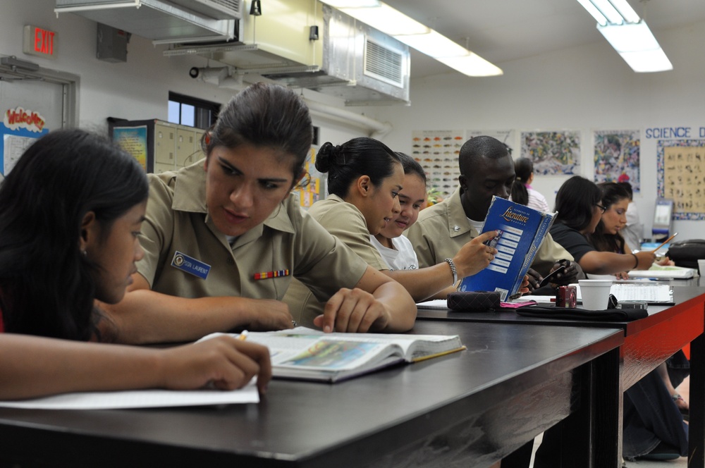 USS Emory S. Land sailors tutors students