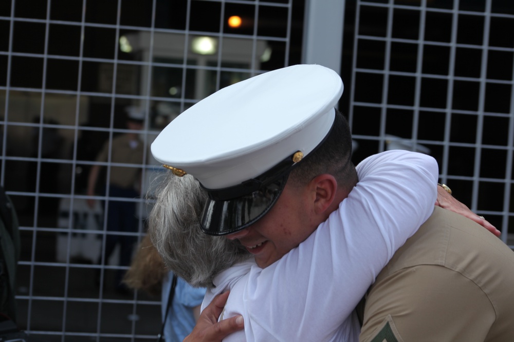 Marine welcomed by family during Fleet Week New York 2012