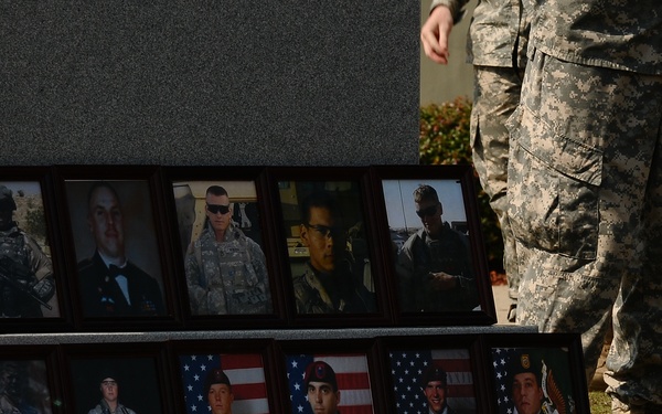 Flowers and photos on memorial