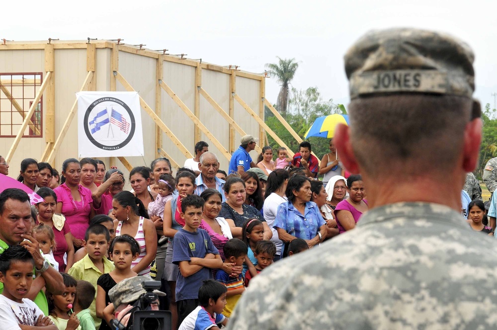 Soldiers celebrate building a schoolhouse for Hondurans