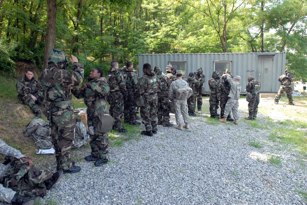 Soldiers from the 19th ESC go through the gas chamber