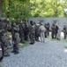 Soldiers from the 19th ESC go through the gas chamber