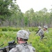 Infantrymen fire into platoon-level training