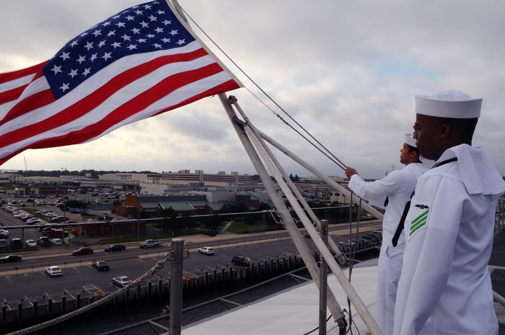 USS George H.W. Bush sailors raise flag in remembrance