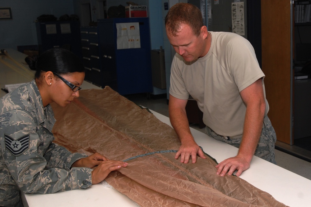 Aircrew Life Support specialists inspect equipment