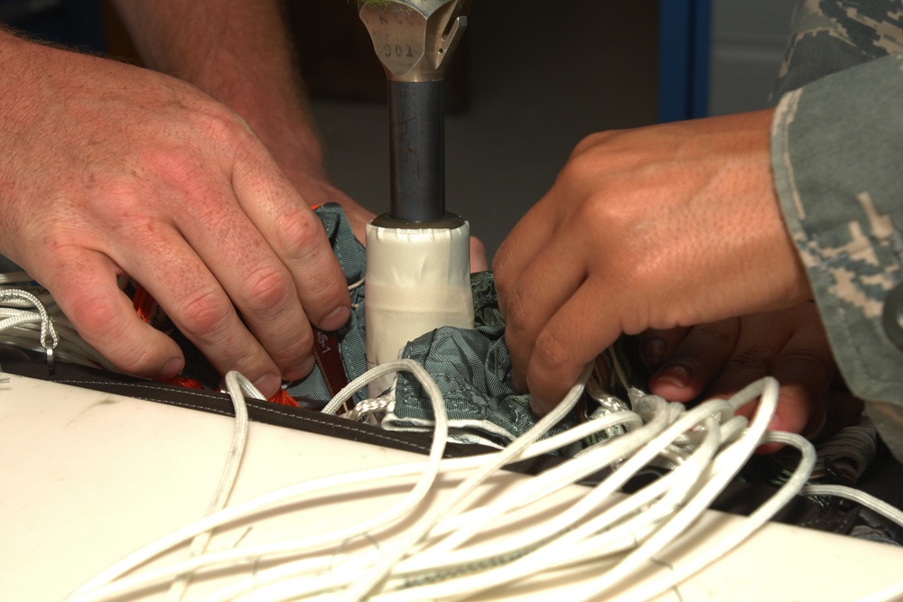 Aircrew Life Support specialists inspect equipment