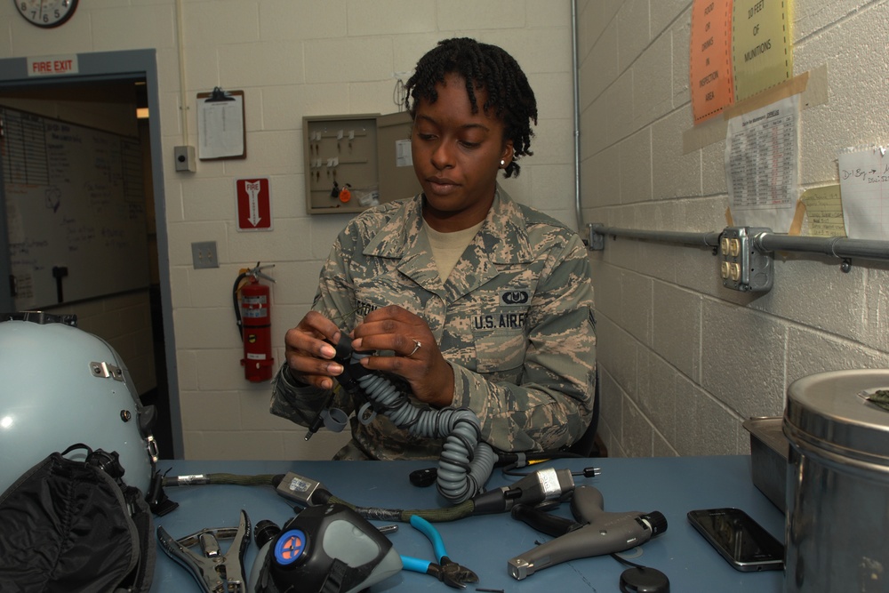 Aircrew Life Support specialists inspect equipment