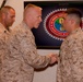 Sgt. Augustin Delgado receives the Navy Commendation Medal