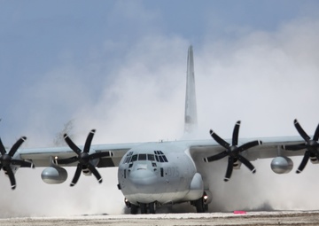 A KC-130J Hercules aircraft lands on Tinian Island's North Field runway