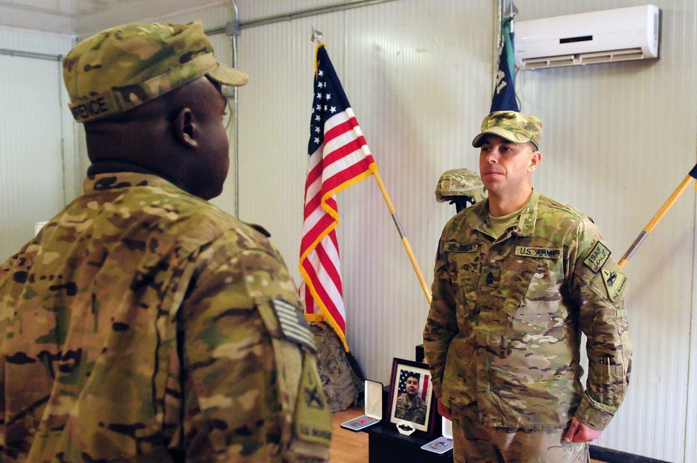 Charlie Company, 1st Battalion, 41st Infantry Regiment pays respects to fallen comrade