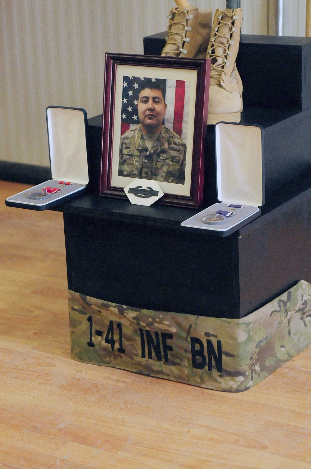 Charlie Company, 1st Battalion, 41st Infantry Regiment pays respects to fallen comrade