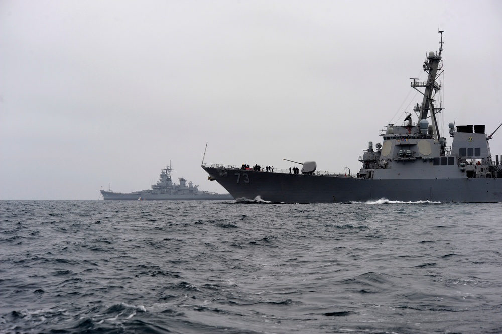 USS Decatur passes USS Iowa in the Pacific