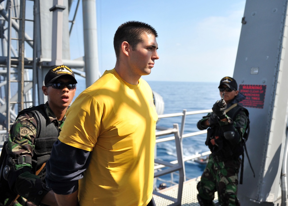 U.S.-Indonesian navies practice visit, board, search and seizure skills aboard USS Vandegrift