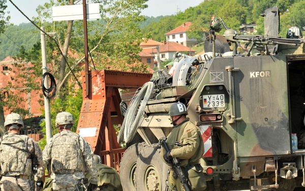 KFOR removes roadblock near Rudare, Kosovo, June 1, 2012