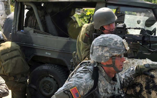 KFOR removes roadblock near Rudare, Kosovo, June 1, 2012