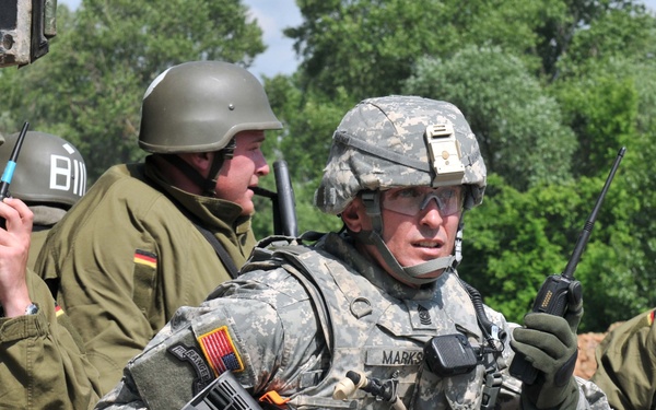 KFOR removes roadblock near Rudare, Kosovo, June 1, 2012