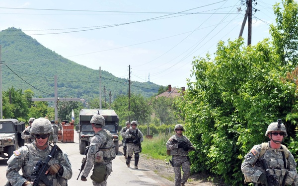 KFOR removes roadblock near Rudare, Kosovo, June 1, 2012