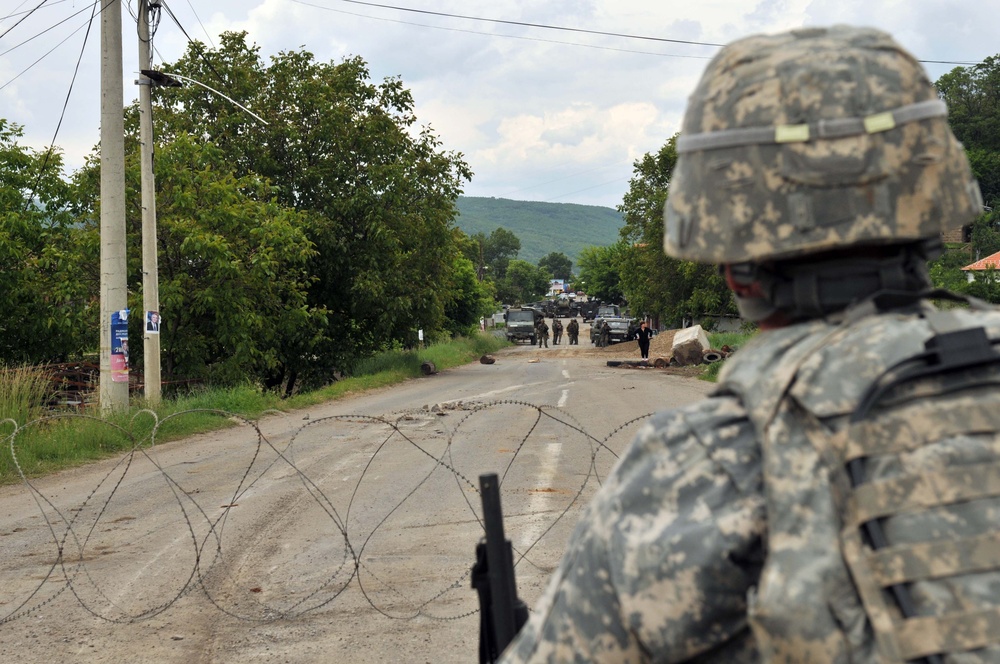 KFOR removes roadblock near Rudare, Kosovo, June 1, 2012