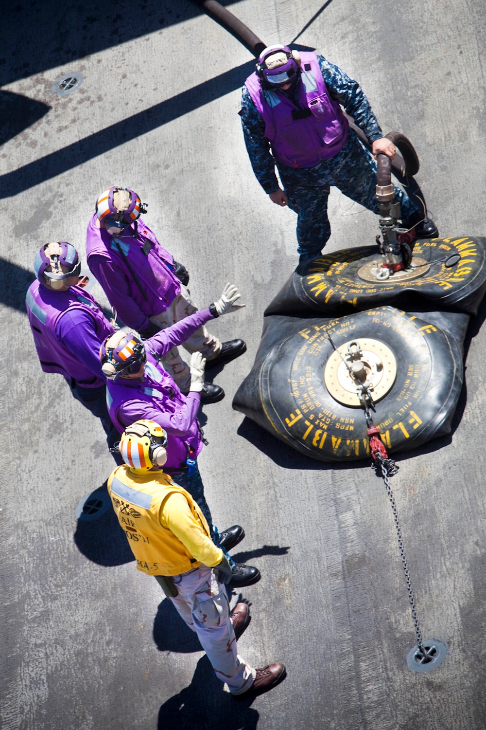 Marines, sailors transfer fuel from ship to shore