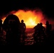 Aircraft rescue, firefighting Marines train through fire, flames