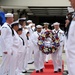 Sailors carry wreath during Battle of Midway ceremony