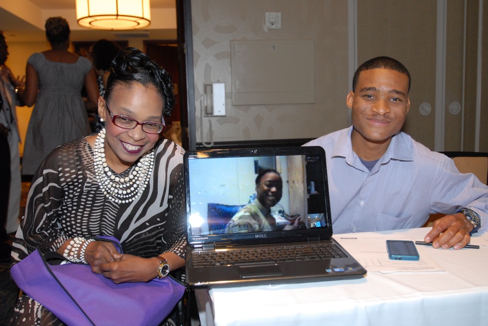 Soldier Skypes with family during a seminar