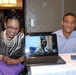 Soldier Skypes with family during a seminar