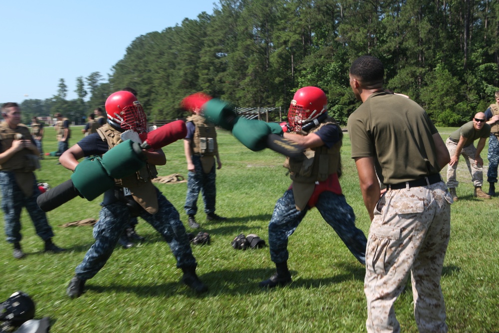 Midshipmen learn from devil dogs during PROTRAMID 2012