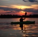 Kayakers take to water in moonlight
