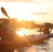 Kayakers take to water in moonlight