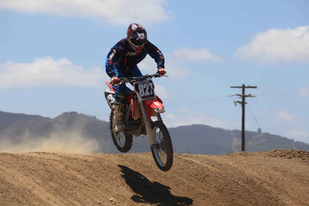 Marines train while riding at Military Dirt Days