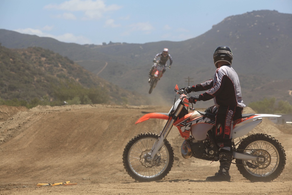 Marines train while riding at Military Dirt Days