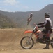Marines train while riding at Military Dirt Days