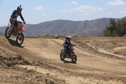 Marines train while riding at Military Dirt Days