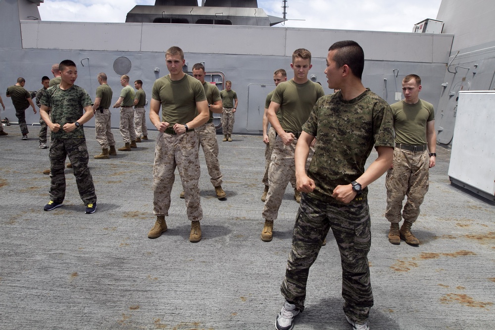 ROK Marines teach U.S. Marines a class aboard USS New Orleans