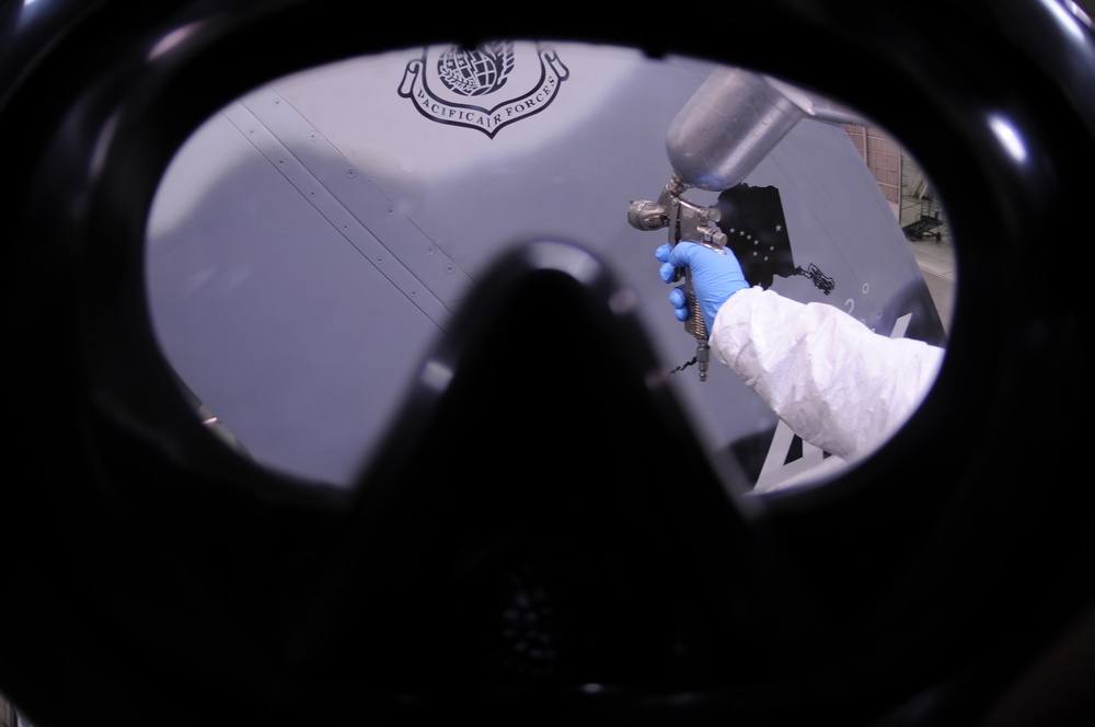 Fabrication airman touch-up Eielson's F-16's