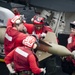 USS George Washington sailors arm a GBU-16 Paveway II