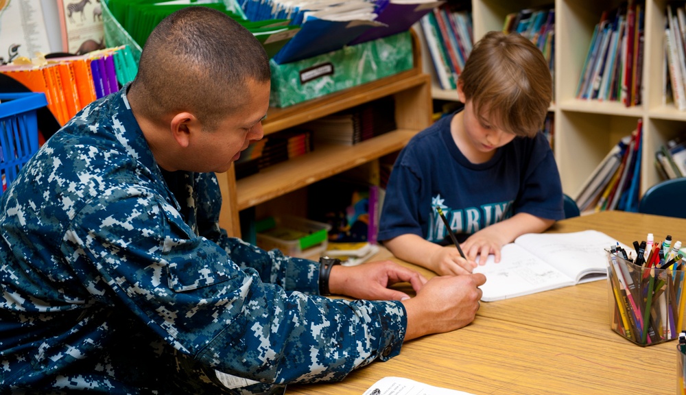 USS John C. Stennis sailors perform community service at school