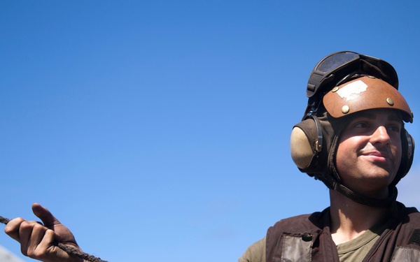Marines maintain a Super Stallion while deployed