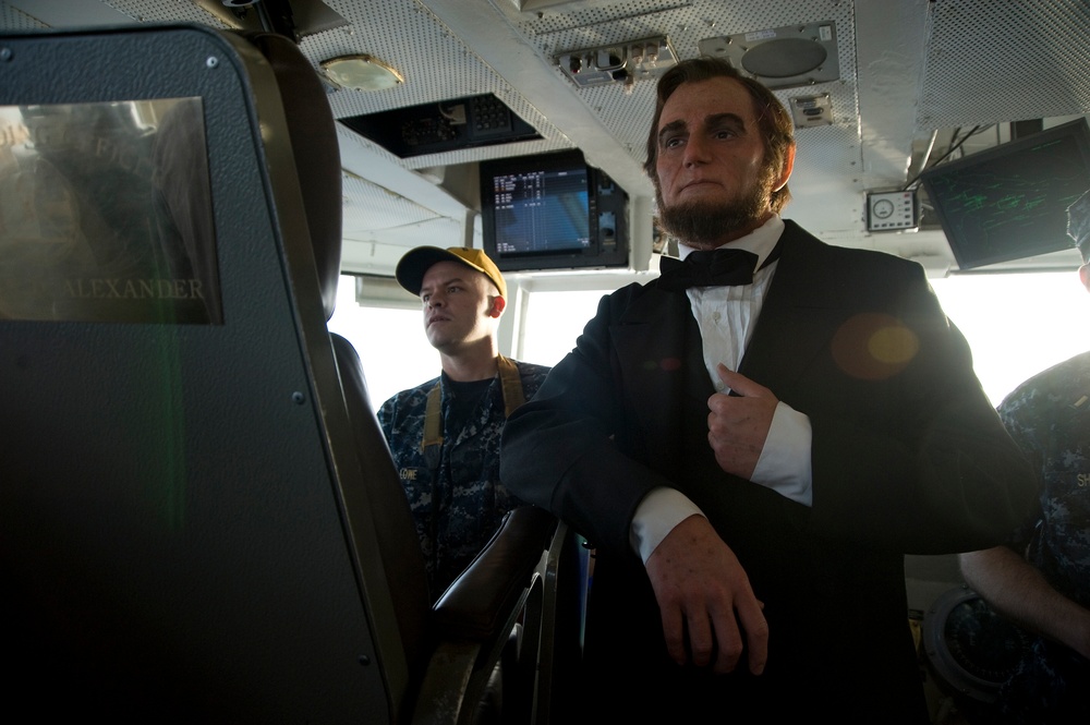 Actor dressed up as president tours USS Abraham Lincoln