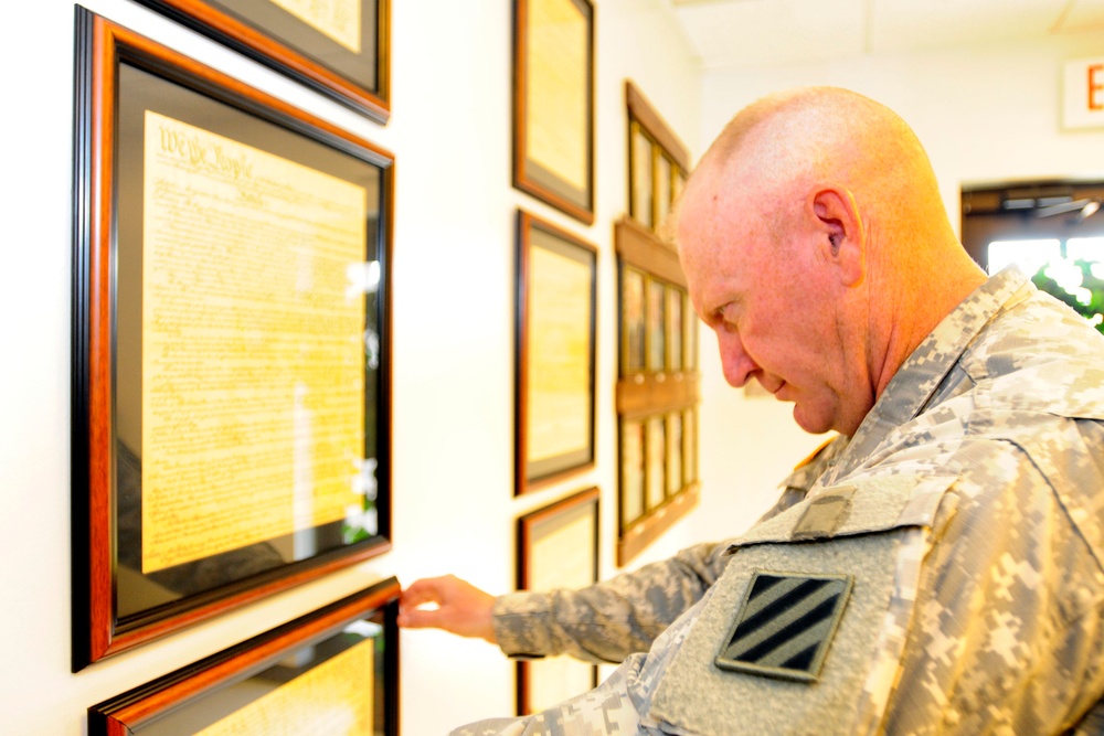 Company first sergeant displays the foundation of America in headquarters building