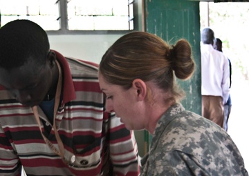 Ugandan students participate in 448th Civil Affairs Battalion Veterinary Program