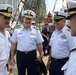 Coast Guard Rear Adm. Steve Ratti and Navy Rear Adm. Greg Nosal enjoy a social moment together