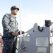 Boatswains Mate 2nd Class Danny Campos pilots a U.S. Naval Academy launch