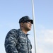 Boatswains Mate 2nd Class Danny Campos pilots a U.S. Naval Academy launch taking Coast Guardsmen to the U.S. Coast Guard Barque Eagle