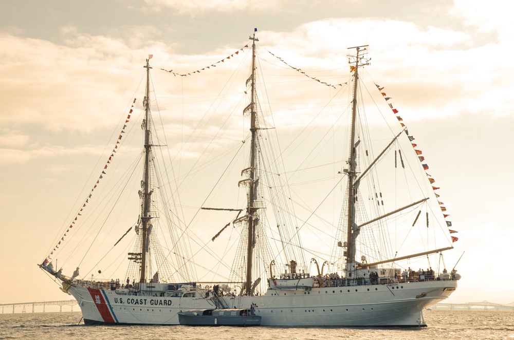 Naval Academy launch lies alongside Coast Guard Barque Eagle