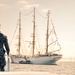 Naval Academy launch lies alongside Coast Guard Barque Eagle