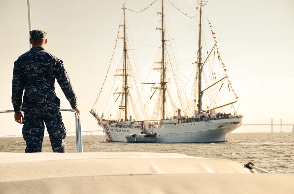 Naval Academy launch lies alongside Coast Guard Barque Eagle