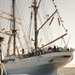 Navy Engineman 1st Class Sewel Baskett stands ready on the bow of a U.S. Naval Academy launch passes a mooring line